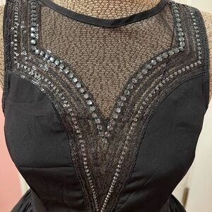 Black dress with sparkly beaded mesh neckline
